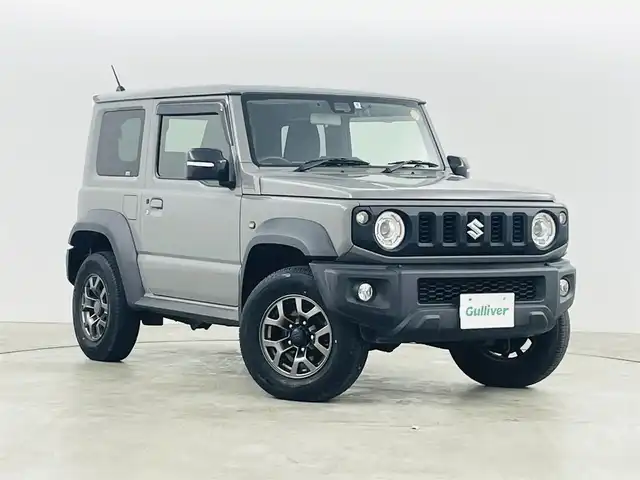 スズキ ジムニー シエラ JC 福島県 2020(令2)年 4.7万km ミディアムグレー スズキセーフティサポート/・デュアルカメラブレーキ/・レーンキープ/・クルーズコントロール/・誤発進抑制機能/・車線逸脱警報、抑制機能/・標識認識機能/・ふらつき警報機能/・先行車発進お知らせ機能/・ビルホールドコントロール/純正SDナビ（CN-RE06W）/・フルセグTV/・バックカメラ/・ETC/・BT/・CD/DVD/・USB/・iPod/・AM/FM/・ステアリングスイッチ/前席シートヒーター/前方ドライブレコーダー /LEDヘッドライト/フォグランプ/純正ホイール/純正フロアマット（ゴムマット）/ドアバイザー/プッシュスタート/スマートキー
