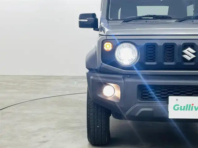 スズキ ジムニー シエラ JC 福島県 2020(令2)年 4.7万km ミディアムグレー スズキセーフティサポート/・デュアルカメラブレーキ/・レーンキープ/・クルーズコントロール/・誤発進抑制機能/・車線逸脱警報、抑制機能/・標識認識機能/・ふらつき警報機能/・先行車発進お知らせ機能/・ビルホールドコントロール/純正SDナビ（CN-RE06W）/・フルセグTV/・バックカメラ/・ETC/・BT/・CD/DVD/・USB/・iPod/・AM/FM/・ステアリングスイッチ/前席シートヒーター/前方ドライブレコーダー /LEDヘッドライト/フォグランプ/純正ホイール/純正フロアマット（ゴムマット）/ドアバイザー/プッシュスタート/スマートキー