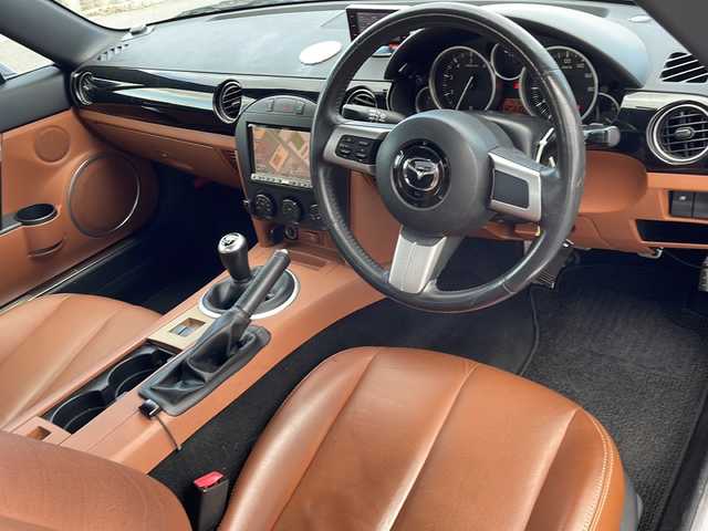 マツダ ロードスター RS RHT 山口県 2007(平19)年 7.3万km ストーミーブルーマイカ 純正HDDナビ/・CD/DVD/AM/FM/iPod/フルセグテレビ/バックカメラ/ETC/スマートキー/スペアキー有/キセノンヘッドライト/フォグランプ/17インチ純正アルミホイール/純正フロアマット/レザーシート/前席シートヒーター/横滑り防止装置/盗難防止装置/取扱説明書