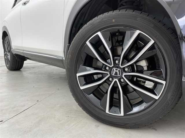 ホンダ ヴェゼル ハイブリッド e:HEV Z 福岡県 2021(令3)年 6.4万km プラチナホワイトパール 純正ナビ（フルセグＴＶ）　/バックカメラ　/ＥＴＣ　/前後ドラレコ　/ＡＣＣ　/コーナーセンサー　/衝突被害軽減ブレーキ　/レーンキープ　/ＢＳＭ　/アクセル踏み間違い防止　/パドルシフト　/パワーバックドア　/ハーフレザー