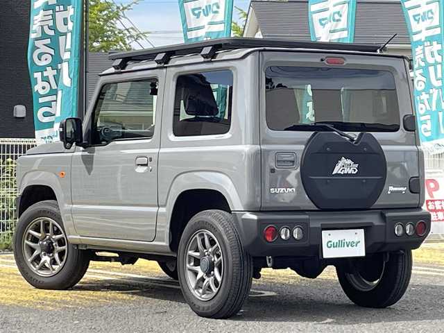 スズキ ジムニー XC 宮城県 2022(令4)年 1.4万km ミディアムグレー /社外メモリナビ//CD/DVD/SD/BT/HDMI/フルセグテレビ//バックカメラ//クルーズコントロール//ETC//社外ドライブレコーダー前後//シートヒーター前席//衝突被害軽減ブレーキ//レーンキープアシスト//ルーフキャリア//背面タイヤカバー（純正背面タイヤ有り）//社外16インチアルミスタッドレスタイヤ積込//スマートキーx2