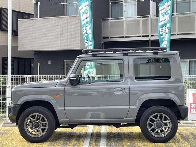 スズキ ジムニー XC 宮城県 2022(令4)年 1.4万km ミディアムグレー /社外メモリナビ//CD/DVD/SD/BT/HDMI/フルセグテレビ//バックカメラ//クルーズコントロール//ETC//社外ドライブレコーダー前後//シートヒーター前席//衝突被害軽減ブレーキ//レーンキープアシスト//ルーフキャリア//背面タイヤカバー（純正背面タイヤ有り）//社外16インチアルミスタッドレスタイヤ積込//スマートキーx2