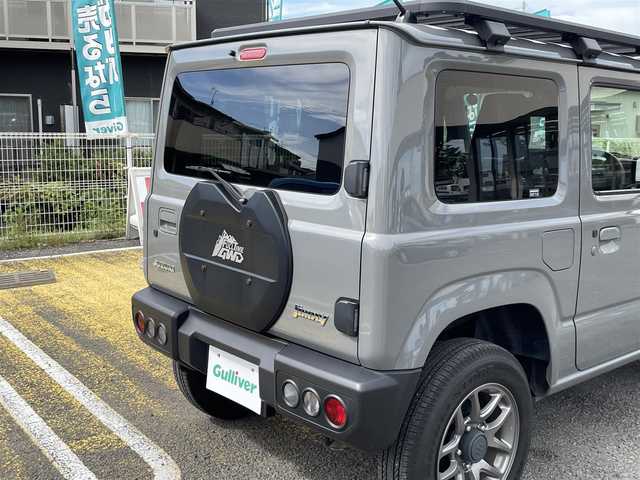 スズキ ジムニー XC 宮城県 2022(令4)年 1.4万km ミディアムグレー /社外メモリナビ//CD/DVD/SD/BT/HDMI/フルセグテレビ//バックカメラ//クルーズコントロール//ETC//社外ドライブレコーダー前後//シートヒーター前席//衝突被害軽減ブレーキ//レーンキープアシスト//ルーフキャリア//背面タイヤカバー（純正背面タイヤ有り）//社外16インチアルミスタッドレスタイヤ積込//スマートキーx2