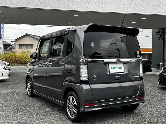 ホンダ Ｎ ＢＯＸ カスタム G Lパッケージ 熊本県 2013(平25)年 13.3万km ポリッシュドメタルメタリック 純正ナビ（VXM-128VS）/【ワンセグTV/CD/DVD】/バックカメラ/片側パワースライドドア/純正14インチAW/アイドリングストップ/横滑り防止/プッシュスタート/スマートキー/スペアキー/ウインカーミラー/純正フロアマット/ドアバイザー/取扱説明書