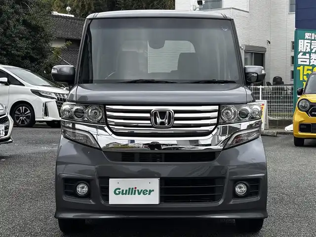 ホンダ Ｎ ＢＯＸ カスタム G Lパッケージ 熊本県 2013(平25)年 13.3万km ポリッシュドメタルメタリック 純正ナビ（VXM-128VS）/【ワンセグTV/CD/DVD】/バックカメラ/片側パワースライドドア/純正14インチAW/アイドリングストップ/横滑り防止/プッシュスタート/スマートキー/スペアキー/ウインカーミラー/純正フロアマット/ドアバイザー/取扱説明書