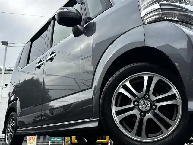 ホンダ Ｎ ＢＯＸ カスタム G Lパッケージ 熊本県 2013(平25)年 13.3万km ポリッシュドメタルメタリック 純正ナビ（VXM-128VS）/【ワンセグTV/CD/DVD】/バックカメラ/片側パワースライドドア/純正14インチAW/アイドリングストップ/横滑り防止/プッシュスタート/スマートキー/スペアキー/ウインカーミラー/純正フロアマット/ドアバイザー/取扱説明書