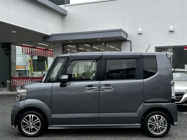 ホンダ Ｎ ＢＯＸ カスタム G Lパッケージ 熊本県 2013(平25)年 13.3万km ポリッシュドメタルメタリック 純正ナビ（VXM-128VS）/【ワンセグTV/CD/DVD】/バックカメラ/片側パワースライドドア/純正14インチAW/アイドリングストップ/横滑り防止/プッシュスタート/スマートキー/スペアキー/ウインカーミラー/純正フロアマット/ドアバイザー/取扱説明書