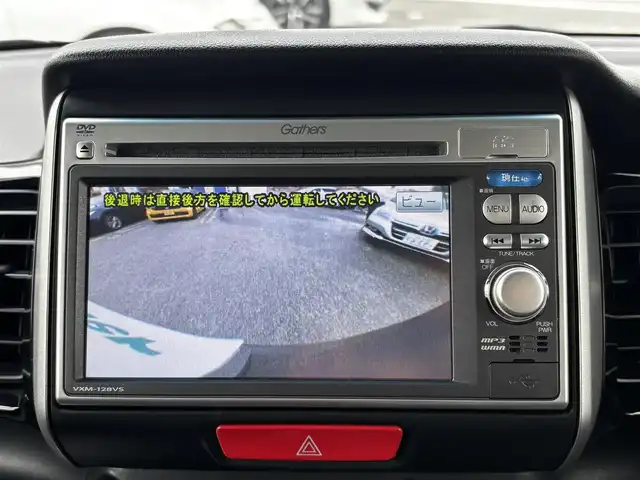 ホンダ Ｎ ＢＯＸ カスタム G Lパッケージ 熊本県 2013(平25)年 13.3万km ポリッシュドメタルメタリック 純正ナビ（VXM-128VS）/【ワンセグTV/CD/DVD】/バックカメラ/片側パワースライドドア/純正14インチAW/アイドリングストップ/横滑り防止/プッシュスタート/スマートキー/スペアキー/ウインカーミラー/純正フロアマット/ドアバイザー/取扱説明書