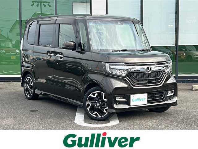 ホンダ Ｎ ＢＯＸ カスタム G L ターボ ホンダセンシング 岐阜県 2019(令1)年 1.6万km プレミアムグラマラスブロンズP 登録時走行距離15840km/社外ナビ/バックモニター/ハーフレザーシート/両側パワースライドドア/プッシュスタート/ホンダセンシング/シートヒーター/ビルトインETC/禁煙車/ドアバイザー/LEDヘッドライト/スマートキー/オートエアコン/ターボ車/レーンキープアシスト/クルーズコントロール/オートライト/純正アルミ/純正フロアマット