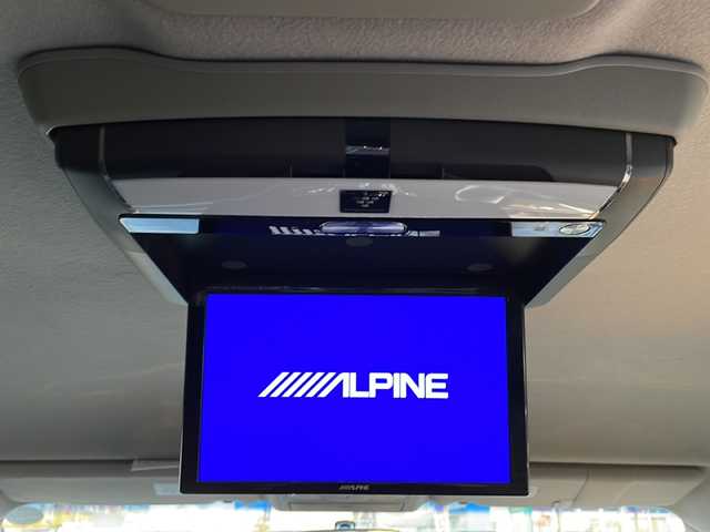 日産 エルグランド 250HWS アーバンクロム ブラックレザー 島根県 2013(平25)年 6.1万km メタルグレー 純正7インチSDナビゲーション(MP313D-W)/ワンセグ BT SD CD DVD HDMI対応/社外10.2インチフリップダウンモニター(PCX-R3300)/バックカメラ/D/N席パワーシート/D/N席シートヒーター/D席メモリシート/両側パワースライドドア/AUTOライト/フォグライト/社外19インチアルミホイール