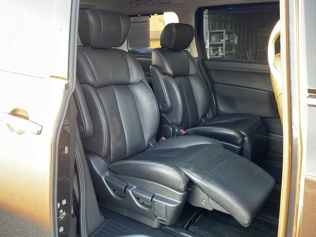 日産 エルグランド 250HWS アーバンクロム ブラックレザー 島根県 2013(平25)年 6.1万km メタルグレー 純正7インチSDナビゲーション(MP313D-W)/ワンセグ BT SD CD DVD HDMI対応/社外10.2インチフリップダウンモニター(PCX-R3300)/バックカメラ/D/N席パワーシート/D/N席シートヒーター/D席メモリシート/両側パワースライドドア/AUTOライト/フォグライト/社外19インチアルミホイール