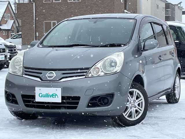 日産 ノート 15X 道央・札幌 2009(平21)年 17万km ブリリアントシルバー ワンオーナー/純正オーディオ/AM/FM/CD/スマートキー/ハロゲンヘッドライト/ヘッドライトレベライザー/電動格納ミラー/社外フロアマット/ドアバイザー/スペアキー/夏タイヤ積込（ゴムのみ）/175/165/R14/2019年/山4mm