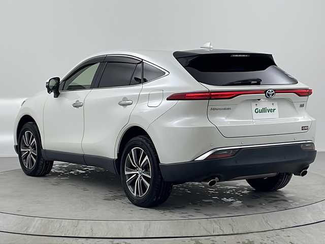 トヨタ ハリアー ハイブリッド G レザーパッケージ 熊本県 2020(令2)年 3.6万km ホワイトパールクリスタルシャイン トヨタセーフティセンス/純正12.3型ディスプレイオーディオナビTV/（T-CONNECT/Bluetooth/FMAM/フルセグTV)/純正JBLプレミアムサウンドシステム（9スピーカー）/純正バックカメラ/純正ビルトイン2.0ETC/純正LEDオートライト/純正LEDフォグ/純正18インチアルミ/純正フロアマット/黒本革シート/プリクラッシュセーフティ/アダプティブクルーズコントロール/レーンディパーチャーアラート/オートマチックハイビーム/ブラインドスポットモニター/デジタルインナーミラー/クリアランスソナー/デュアルオートエアコン/前席パワーシート/エアシート/シートヒーター/パワーチルトステアリング/ステアリングヒーター/パワーバックドア/本革巻ハンドル/スマートキー/プッシュエンジンスタート/新車時保証書/取扱い説明書