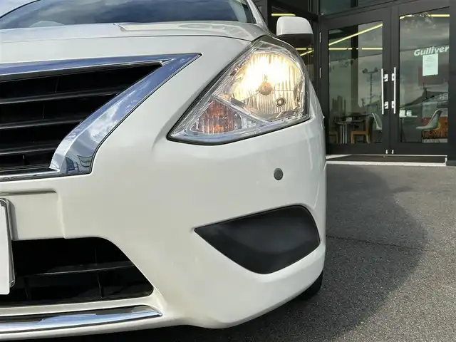 日産 ラティオ G 愛媛県 2015(平27)年 1.7万km ブリリアントホワイトパール 純正7型ナビ/アイドリングストップ/クリアランスソナー/純正フロアマット/プッシュスタート/ヘッドライトレベライザー/純正ドアバイザー/電格ミラー/シガーソケット/純正ホイールキャップ/スペアキー/現状サマー(鉄)(175/70/R14)/YOKOHAMA BluEarth EsEs32