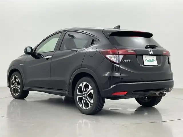 ホンダ ヴェゼル ハイブリッド Z 熊本県 2014(平26)年 10.6万km クリスタルブラックパール 社外7インチナビ（ＣＤ・ＤＶＤ・フルセグ・ＢＴ・ＳＤ・ｉｐｏｄ・ＵＳＢ）/バックカメラ　/ビルトインＥＴＣ　/前席シートヒーター　/クルーズコントロール　/横滑り防止　/先行車発進お知らせ/アイドリングストップ/横滑り防止　/ハーフレザーシート/社外フロアマット/純正１７インチAW/オートライト　/ＬＥＤヘッドライト/スマートキー/プッシュスタート/取扱説明書