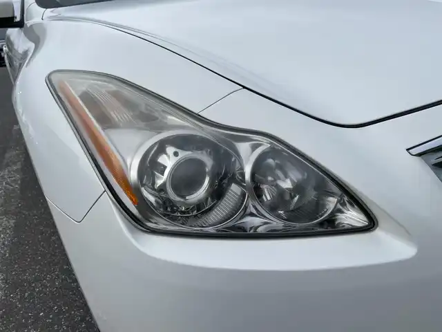 日産 スカイライン 370GT Type S 青森県 2009(平21)年 15.1万km クリスタルホワイトパール FR駆動/6速MT/純正HDDナビ/　 AM/FM/BT/CFカード/CD/DVD/AUX/アナログTV/バックカメラ/HIDオートライト/フォグランプ/パワーシート/純正19インチアルミホイール/スマートキー/スタッドレスタイヤ付き社外アルミホイール保管/　 (225/50/R18)