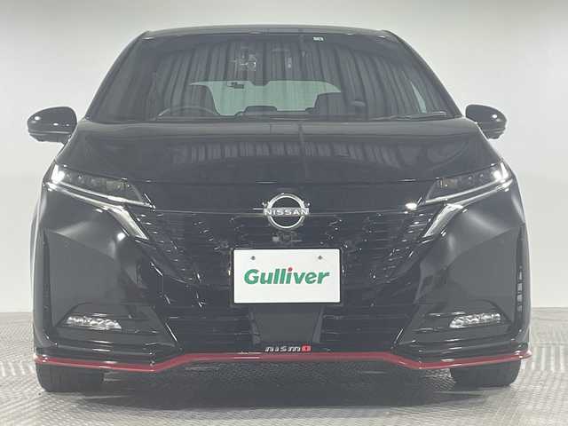 日産 オーラ ニスモ 神奈川県 2022(令4)年 2.2万km スーパーブラック 9インチ日産コネクトナビ　/NISMO ‐AM/FM/TV/BT/USB/AndroidAuto/AppleCarPlay　　/アラウンドビューモニター　/エマージェンシーブレーキ　/プロパイロット　/前後ソナー　/ワイヤレス充電　/インテリジェントルームミラー　/オートホールド　/ステアリングヒーター　/革巻きステアリング　/ウィンカーミラー　/前後ドラレコ