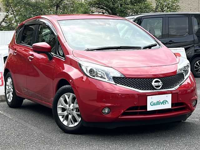 日産 ノート X DIG－S Vセレ +セーフⅡ 埼玉県 2016(平28)年 3.8万km バーニングレッド 走行距離37878km/アンシャンテ/ワンオーナー/純正SDナビ（MC315D-W）/AM/FM/CD/DVD/フルセグTV/i Pod/バックカメラ/全方位モニター/純正15インチアルミホイール/純正フロアマット/ETC/衝突軽減装置/横滑り防止装置/レーンキープアシスト/コーナーセンサー/前後ドライブレコーダー/エコモード/アイドリングストップ/助手席電動回転シート/ステアリングリモコン/LEDヘッドライト/フォグランプ/電動格納ミラー/ウィンカーミラー/ドアバイザー/スマートキー×１/保証書/取扱説明書