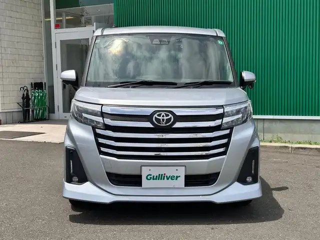 トヨタ ルーミー カスタムG－T 宮城県 2020(令2)年 2.9万km ブライトシルバーM コンフォートパッケージ/・シートヒーター（運転席/助手席）/・シートバックテーブル（運転席/助手席）/パノラミックビュー対応ナビレディパッケージ/・パノラミックビューモニター/・ステアリングスイッチ/＝＝＝/スマートアシスト/・衝突回避支援ブレーキ機能/・衝突警報/・車線逸脱警報機能/・ブレーキ制御付誤発進抑制機能/・先行車発進お知らせ機能/・アダプティブドライビングビーム/・アダプティブクルーズコントロール/・ふらつき警報/・サイドビューランプ/・コーナーセンサー/・路外逸脱警報/・標識認識機能/純正ナビ（NSZT-W68T）/・CD/DVD/・Bluetooth/・フルセグTV/ビルトインETC/ドライブレコーダー/ウェルカムパワースライドドア（運転席側/助手席側）/革巻きステアリング/電動パーキングブレーキ/ブレーキホールド/LEDヘッドランプ/フォグランプ/オートライト/スマートキー＆プッシュスタート/スペアキー/電動格納ミラー/純正15インチAW/純正フロアマット/Wエアバッグ