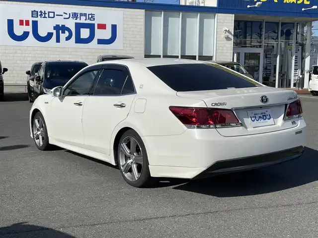 トヨタ クラウン ハイブリッド アスリートS 東京都 2013(平25)年 12.6万km ホワイトパールクリスタルシャイン (株)IDOMが運営する【じしゃロン昭島店】の自社ローン対象車両になります。こちらは現金ご利用時の価格です。自社ローンご希望の方は別途その旨お申付け下さい。					純正8インチナビ/パワーシート/シートヒーター/クルーズコントロール/ETC/ドライブレコーダー/ステアリングヒーター/DVD/フルセグTV/オートライト/フォグランプ/純正アルミホイール/バックカメラ/純正フロアマット/カーテンエアバック/禁煙車