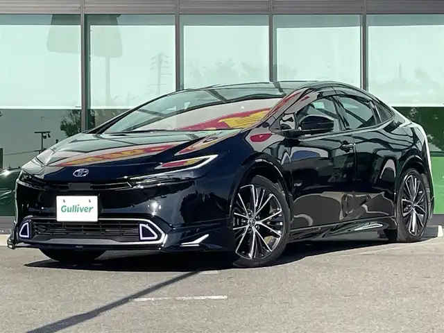 トヨタ プリウス Z 和歌山県 2023(令5)年 2.8万km アティチュードブラックマイカ 純正12.3インチコネクティッドナビ/フルセグTV/Bluetooth/全周囲カメラ/ビルトインETC2.0/デジタルインナーミラー/前後ドライブレコーダー/置くだけ充電/モデリスタエアロ（ネオアドバンススタイル）/トヨタセーフティセンス/レーダークルーズコントロール/BSM/革巻きステアリング/ステアリングスイッチ/ステアリングヒーター/レザーシート/前席シートヒーター/前席シートベンチレーション/運転席パワーシート/シートメモリー2/電動リアゲート/電動パーキング/オートブレーキホール祖/LEDヘッドライト/オートライト/オートハイビーム/プッシュスタート/スマートキー/保証書