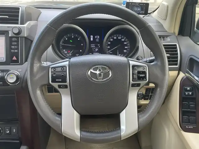 トヨタ ランドクルーザー プラド TX Lパッケージ 宮城県 2015(平27)年 19.7万km ホワイトパールクリスタルシャイン 4WD/純正メモリーナビ/（ＡＭ／ＦＭ／ＣＤ／ＤＶＤ／Ｂｌｕｅｔｏｏｔｈ）　/サンルーフ　/モデリスタエアロ　/ベージュレザーシート　/ルーフレール/クルーズコントロール　/センターデフロック　/コーナーセンサー　/横滑り防止装置/ダウンヒルアシストコントロール/フロントワイパーデアイサー/ヘッドライトウォッシャー/前席シートヒーター/前席パワーシート/バックカメラ/フロントカメラ/サイドカメラ/スマートキー/プッシュスタート/ETC/ドラレコ/牽引/純正バグガード
