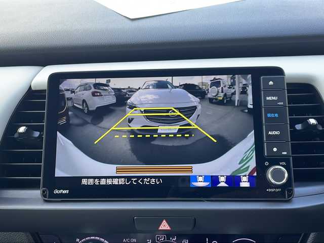 ホンダ フィット e:HEVホーム 道北・旭川 2023(令5)年 1.4万km プラチナホワイトパール ・純正ナビ/BT/DTV/DVD/CD/USB/・寒冷地仕様/・４WD/・前席シートヒーター/・バックカメラ/・社外前後ドライブレコーダー/・ステアリングリモコン/・電動パーキングブレーキ/・オートブレーキホールド/・ホンダセンシング/衝突軽減ブレーキ/踏み間違い衝突軽減システム/急アクセル抑制機能/路外逸脱抑制機能/歩行者事故低減ステアリング/先行車発進お知らせ機能/標識認識機能/レーダークルーズコントロール/・電動格納ミラー/・純正ゴムフロアマット/・純正カーペット/・ミラーヒーター/・ワイパーデアイサー/・保証書/・取説/・ナビ説/・スペアキー