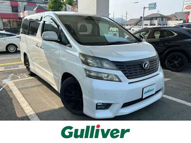 トヨタ ヴェルファイア 2．4Z プラチナセレクション 兵庫県 2009(平21)年 16.1万km ホワイトパールクリスタルシャイン 純正ナビ/(CD/DVD/MD/HDD)/バックカメラ/ETC/両側パワースライドドア/パワーバックドア/HIDヘッドライト/オートライト/フォグランプ/ステアリングリモコン/スマートキー/スペアキー/純正フロアマット
