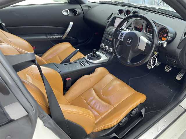 日産 フェアレディ Ｚ バージョンST 滋賀県 2005(平17)年 11万km ホワイトパール 純正ナビ/(CD/MD)/前後ドラレコ/オレンジ革シート/シートヒーター/パワーシート/ステアリングスイッチ/ETC