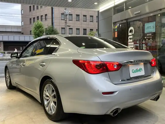 日産 スカイライン ハイブリッド 350GT Type P 東京都 2015(平27)年 3.1万km ブリリアントシルバー ワンオーナー/黒レザーシート/前席パワーシート/前席シートヒーター/純正SDナビ/CD/DVD/BT/USB/AUX/アラウンドビューモニター/インテリジェントクルーズコントロール/エマージェンシーブレーキ/車線逸脱警報(LDW)/車線逸脱防止支援システム(LDP)/後側方車両検知警報(BSW)/後側方衝突防止支援システム(BSI)/インテリジェントペダル/クリアランスソナー/純正17インチアルミホイール/アイドリングストップ/ビルトインETC/LEDライト＆フォグ/スマートキー