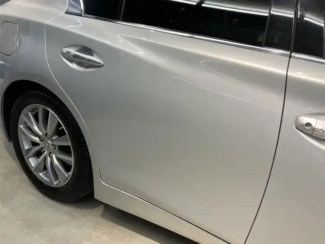 日産 スカイライン ハイブリッド 350GT Type P 東京都 2015(平27)年 3.1万km ブリリアントシルバー ワンオーナー/黒レザーシート/前席パワーシート/前席シートヒーター/純正SDナビ/CD/DVD/BT/USB/AUX/アラウンドビューモニター/インテリジェントクルーズコントロール/エマージェンシーブレーキ/車線逸脱警報(LDW)/車線逸脱防止支援システム(LDP)/後側方車両検知警報(BSW)/後側方衝突防止支援システム(BSI)/インテリジェントペダル/クリアランスソナー/純正17インチアルミホイール/アイドリングストップ/ビルトインETC/LEDライト＆フォグ/スマートキー