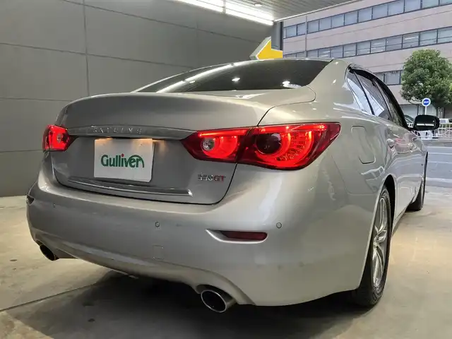 日産 スカイライン ハイブリッド 350GT Type P 東京都 2015(平27)年 3.1万km ブリリアントシルバー ワンオーナー/黒レザーシート/前席パワーシート/前席シートヒーター/純正SDナビ/CD/DVD/BT/USB/AUX/アラウンドビューモニター/インテリジェントクルーズコントロール/エマージェンシーブレーキ/車線逸脱警報(LDW)/車線逸脱防止支援システム(LDP)/後側方車両検知警報(BSW)/後側方衝突防止支援システム(BSI)/インテリジェントペダル/クリアランスソナー/純正17インチアルミホイール/アイドリングストップ/ビルトインETC/LEDライト＆フォグ/スマートキー