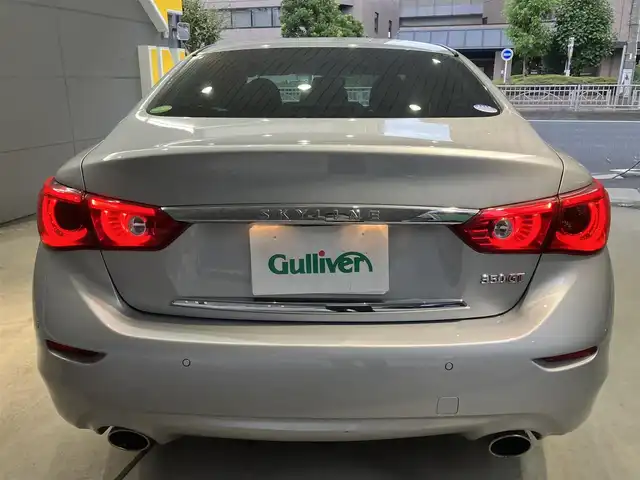 日産 スカイライン ハイブリッド 350GT Type P 東京都 2015(平27)年 3.1万km ブリリアントシルバー ワンオーナー/黒レザーシート/前席パワーシート/前席シートヒーター/純正SDナビ/CD/DVD/BT/USB/AUX/アラウンドビューモニター/インテリジェントクルーズコントロール/エマージェンシーブレーキ/車線逸脱警報(LDW)/車線逸脱防止支援システム(LDP)/後側方車両検知警報(BSW)/後側方衝突防止支援システム(BSI)/インテリジェントペダル/クリアランスソナー/純正17インチアルミホイール/アイドリングストップ/ビルトインETC/LEDライト＆フォグ/スマートキー