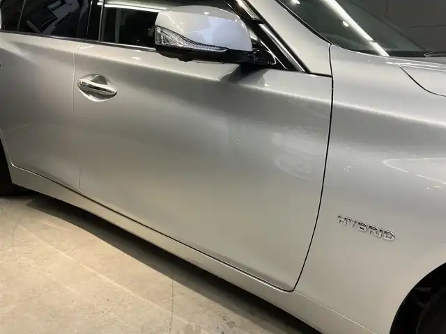 日産 スカイライン ハイブリッド 350GT Type P 東京都 2015(平27)年 3.1万km ブリリアントシルバー ワンオーナー/黒レザーシート/前席パワーシート/前席シートヒーター/純正SDナビ/CD/DVD/BT/USB/AUX/アラウンドビューモニター/インテリジェントクルーズコントロール/エマージェンシーブレーキ/車線逸脱警報(LDW)/車線逸脱防止支援システム(LDP)/後側方車両検知警報(BSW)/後側方衝突防止支援システム(BSI)/インテリジェントペダル/クリアランスソナー/純正17インチアルミホイール/アイドリングストップ/ビルトインETC/LEDライト＆フォグ/スマートキー