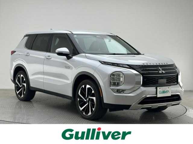 三菱 アウトランダー ＰＨＥＶ G 兵庫県 2022(令4)年 5万km ホワイトダイヤモンド 純正9インチナビ/フルセグ BT Apple CarPlay android Auto/全方位カメラ/パワーバックドア/衝突軽減ブレーキ/LKA/BSM/レーダークルーズコントロール/ビルトインETC2.0/ワイヤレス充電/ドライブレコーダー/ハーフレザーシート/シートヒーター/パワーシート/LEDヘッドライト/オートライト/オートハイビーム/スマートキー