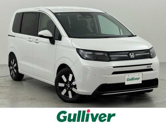 ホンダ フリード ハイブリット e:HEV AIR EX 福岡県 2025(令7)年 0.1千km プラチナホワイトパール 登録済未使用車　/純正９型ナビ/フルセグTV　/バックカメラ　/ホンダセンシング　/レーダークルコン　/コーナーセンサー　/衝突軽減ブレーキ　/レーンキープ　/アクセル踏み間違い防止　/ＢＳＭ　/両側電動スライドドア　/シートヒーター　/ハーフレザーシート　/Wエアコン　/LEDヘッドライト　/純正１５インチアルミホイール