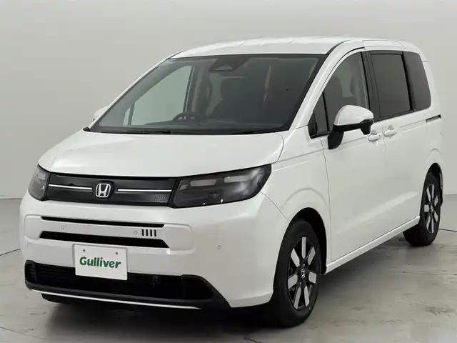 ホンダ フリード ハイブリット e:HEV AIR EX 福岡県 2025(令7)年 0.1千km プラチナホワイトパール 登録済未使用車　/純正９型ナビ/フルセグTV　/バックカメラ　/ホンダセンシング　/レーダークルコン　/コーナーセンサー　/衝突軽減ブレーキ　/レーンキープ　/アクセル踏み間違い防止　/ＢＳＭ　/両側電動スライドドア　/シートヒーター　/ハーフレザーシート　/Wエアコン　/LEDヘッドライト　/純正１５インチアルミホイール