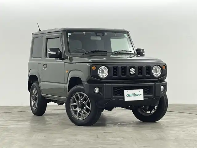 スズキ ジムニー XC 福島県 2024(令6)年 0.8万km ジャングルグリーン スズキ セーフティ サポート/・衝突被害軽減ブレーキ　/・誤発進抑制機能　/・車線逸脱警報機能　/・ふらつき警報機能　/・先行車発進お知らせ機能　/・ハイビームアシスト　/・アダプティブクルーズコントロール　/・標識認識機能　/社外ナビゲーション/・Bluetooth/TV/SD/AM・FM/CD/DVD/・バックカメラ/革巻きステアリング/・ステアリングスイッチ/シートヒーター/プッシュスタート/・スマートキー/LEDライト/・フォグライト/・オートライト/・オートハイビーム/純正フロアマット/ドアバイザー