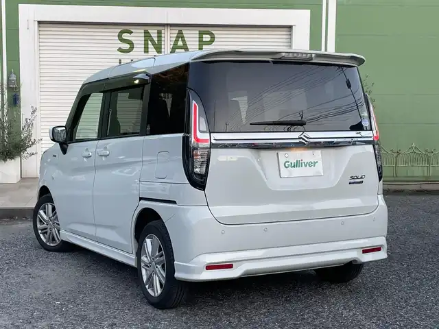 スズキ ソリオ HV MX 埼玉県 2020(令2)年 1.3万km ピュアホワイトP 衝突軽減ブレーキ/レーダークルーズコントロール/前席シートヒーター/LEDヘッドライト/クリアランスソナー/純正15インチアルミ/左パワースライドドア/プッシュスタート/スマートキー/走行１２９３３キロ/保証書付整備手帳/取扱説明書