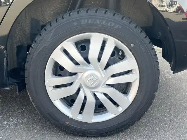 ホンダ フィット 13G Fパッケージ 秋田県 2016(平28)年 6.7万km クリスタルブラックパール 社外ナビ/フルセグ/４WD/スマートキー/ETC/アイドリングストップ/プッシュスタート/純正フロアマット/純正ドアバイザー/寒冷地仕様/パワーステアリング/パワーウィンドウ/オートエアコン/オートライト/横滑り防止/電動格納ウィンカーミラー/保証書/取扱説明書/記録簿
