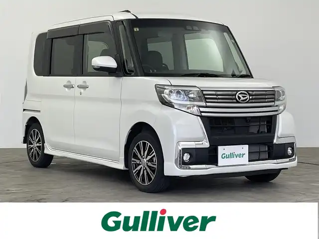 ダイハツ タント カスタムX トップED LTD SAⅢ 大分県 2018(平30)年 2.5万km パールホワイトⅢ 純正ナビ/（地デジ/Bluetooth/USB/DVD）/全方位カメラ/ETC/前方ドライブレコーダー/両側電動スライドドア/衝突軽減ブレーキ/オートマチックハイビーム/LEDオートヘッドライト/フォグライト/ハーフレザーシート/運転席シートヒーター/純正フロアマット/ドアバイザー/純正14インチアルミホイール/スタッドレスタイヤ積込み/プッシュスタート＆スマートキー