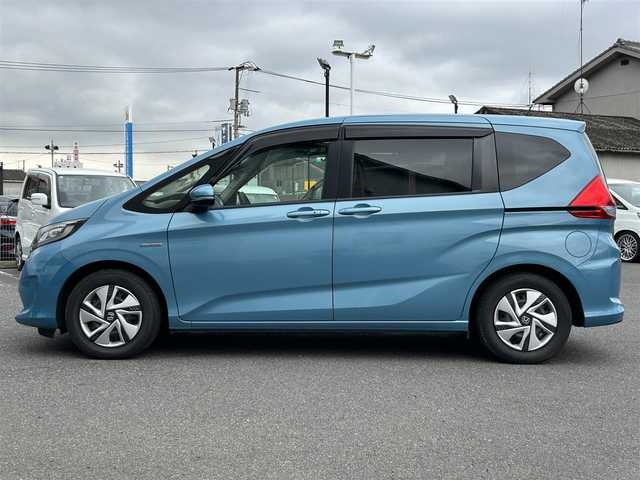 ホンダ フリード＋ ハイブリット G ホンダセンシング 広島県 2018(平30)年 4.4万km ブルーホライゾンM 純正メモリーナビ/（CD/DVD/BT/フルセグ）/バックカメラ/レーダークルーズコントロール/Honda SENSING/Ｈｏｎｄａスマートキーシステム＋イモビライザー/両側パワースライドドア/スライドドアイージークローザー(リア両側)/LEDヘッドライト＋アクティブコーナリングライト/オートライト/ETC/センターテーブル/Cパッケージ/コンフォートビューパッケージ/フロアマット/取扱説明書