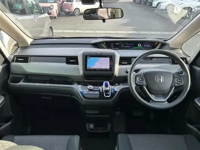 ホンダ フリード＋ ハイブリット G ホンダセンシング 静岡県 2018(平30)年 4.5万km ブルーホライゾンM エンジンスタートボタン/パワーステアリング/パワーウィンドウ/寒冷地仕様/アイドリングストップ/スマートキー/AAC/クルーズコントロール（追従走行：有）/純正ビルトインETC/バックカメラ/純正メモリナビ（BT接続、ワンセグTV、DVD再生機能、CDチェンジャー）/ウォークスルー/布系シート/純正フロアマット/両側パワースライドドア/ABS/横滑り防止装置/レーンキープアシスト/オートライト/キセノンヘッドライト/Wエアバック/衝突軽減システム