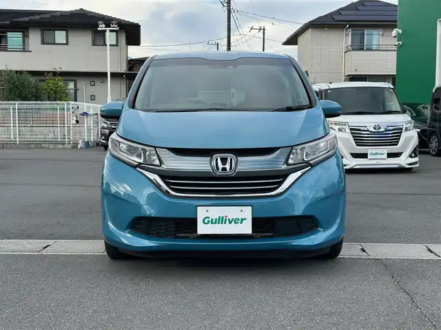 ホンダ フリード＋ ハイブリット G ホンダセンシング 静岡県 2018(平30)年 4.5万km ブルーホライゾンM エンジンスタートボタン/パワーステアリング/パワーウィンドウ/寒冷地仕様/アイドリングストップ/スマートキー/AAC/クルーズコントロール（追従走行：有）/純正ビルトインETC/バックカメラ/純正メモリナビ（BT接続、ワンセグTV、DVD再生機能、CDチェンジャー）/ウォークスルー/布系シート/純正フロアマット/両側パワースライドドア/ABS/横滑り防止装置/レーンキープアシスト/オートライト/キセノンヘッドライト/Wエアバック/衝突軽減システム