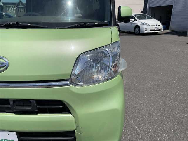 ダイハツ タント L SA 道央・札幌 2014(平26)年 6.9万km マスカットグリーンメタリック ４WD/社外SDナビ(AM/FM/CD/DVD)/ワンセグ(走行中視聴可能)/バックカメラ/アイドリングストップ/ドアバイザー/純正フロアマット/両側スライドドア/ベンチシート/ETC/横滑り防止装置/衝突軽減ブレーキ/盗難防止装置/ステアリングスイッチ/後席用サンシェード/積込夏タイヤ/　(純正AW付 165/55R15 18年製 溝３ｍｍ)