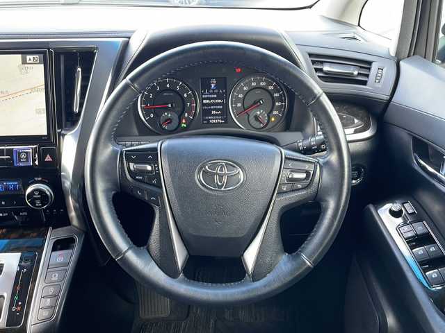 トヨタ ヴェルファイア Z 道東・釧路十勝 2016(平28)年 11万km ホワイトパールクリスタルシャイン ・寒冷地仕様/・4WD/・ALPINE11型SDメモリビ/（CD・DVD・FM・AM・BT・SD・フルセグ）/・バックカメラ/・衝突軽減システム/・オートリトラーミラー/・ウッド調パネル/・ナノイー/・クリアランスソナー/・フロントワイパーデアイサー/・両側パワースライドドア/・社外エンジンスターター/・セカンドシートオットマン/・ETC/・アイドリングストップ/・横滑り防止/・電格ミラー/・ドアバイザー/・スマートキー/・プッシュスタート/・ウェッズクレンツェ19インチアルミホイール