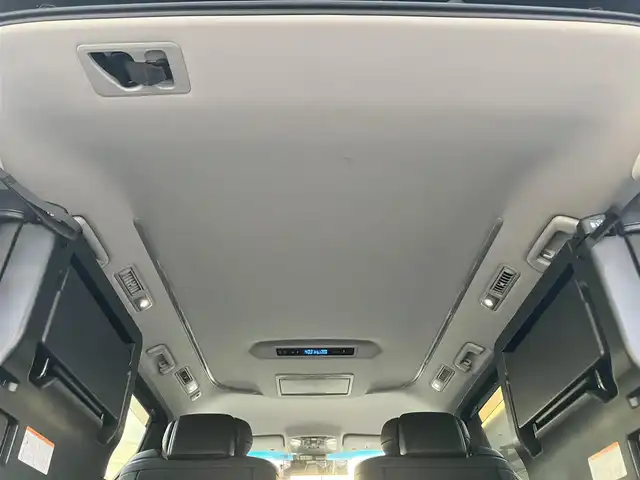 トヨタ ヴェルファイア Z Gエディション 静岡県 2021(令3)年 1.1万km ブラック 純正9インチナビ（CD/DVD/BT）/バックカメラ/エンジンスタートボタン/パワーステアリング/パワーウィンドウ/保証書/取扱説明書/スマートキー/Wオートエアコン/レーダークルーズコントロール/12.1インチ後席モニター/USB入力端子/ETC/三列シート/N席電動オットマン/電動リアゲート/ドライブレコーダー前後/フロアマット/D席N席パワーシート/合皮シート/D席N席シートヒーター/D席N席エアシート/両側パワースライドドア/純正アルミホイール/ABS/横滑り防止装置/コーナーセンサー前後/レーンキープアシスト/盗難防止装置/オートライト/オートマチックハイビーム/三眼LEDヘッドライト/W+サイドエアバッグ/カーテンエアバッグ/衝突軽減システム/ステアリングヒーター/二列目電動リクライニング/二列目電動オットマン/三列目ヘッドレスト１つ不足