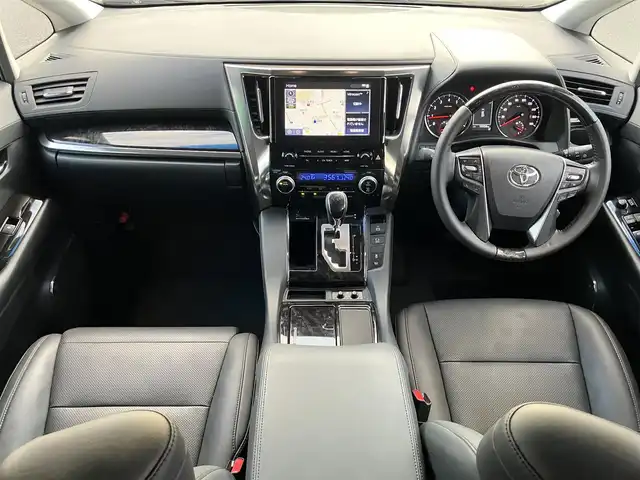 トヨタ ヴェルファイア Z Gエディション 静岡県 2021(令3)年 1.1万km ブラック 純正9インチナビ（CD/DVD/BT）/バックカメラ/エンジンスタートボタン/パワーステアリング/パワーウィンドウ/保証書/取扱説明書/スマートキー/Wオートエアコン/レーダークルーズコントロール/12.1インチ後席モニター/USB入力端子/ETC/三列シート/N席電動オットマン/電動リアゲート/ドライブレコーダー前後/フロアマット/D席N席パワーシート/合皮シート/D席N席シートヒーター/D席N席エアシート/両側パワースライドドア/純正アルミホイール/ABS/横滑り防止装置/コーナーセンサー前後/レーンキープアシスト/盗難防止装置/オートライト/オートマチックハイビーム/三眼LEDヘッドライト/W+サイドエアバッグ/カーテンエアバッグ/衝突軽減システム/ステアリングヒーター/二列目電動リクライニング/二列目電動オットマン/三列目ヘッドレスト１つ不足