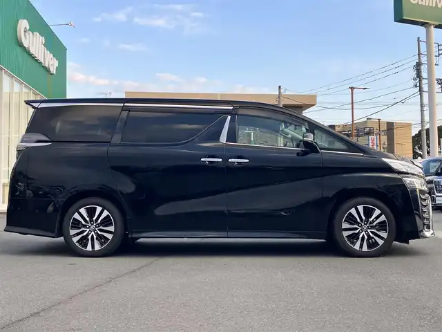 トヨタ ヴェルファイア Z Gエディション 静岡県 2021(令3)年 1.1万km ブラック 純正9インチナビ（CD/DVD/BT）/バックカメラ/エンジンスタートボタン/パワーステアリング/パワーウィンドウ/保証書/取扱説明書/スマートキー/Wオートエアコン/レーダークルーズコントロール/12.1インチ後席モニター/USB入力端子/ETC/三列シート/N席電動オットマン/電動リアゲート/ドライブレコーダー前後/フロアマット/D席N席パワーシート/合皮シート/D席N席シートヒーター/D席N席エアシート/両側パワースライドドア/純正アルミホイール/ABS/横滑り防止装置/コーナーセンサー前後/レーンキープアシスト/盗難防止装置/オートライト/オートマチックハイビーム/三眼LEDヘッドライト/W+サイドエアバッグ/カーテンエアバッグ/衝突軽減システム/ステアリングヒーター/二列目電動リクライニング/二列目電動オットマン/三列目ヘッドレスト１つ不足