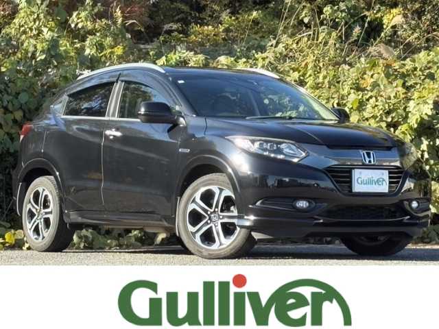 ホンダ ヴェゼル ハイブリッド Z 大分県 2015(平27)年 10.3万km クリスタルブラックパール ワンオーナー /あんしんパッケージ/ハーフレザーシート/シートヒーター/社外メモリーナビ/バックカメラ/フルセグ /DVD/Bluetooth/前後ドライブレコーダー/クルーズコントロール/純正17インチアルミホイール/スマートキー/エンジンプッシュスタート/純正LEDヘッドライト/オートライトコントロール/パドルシフト